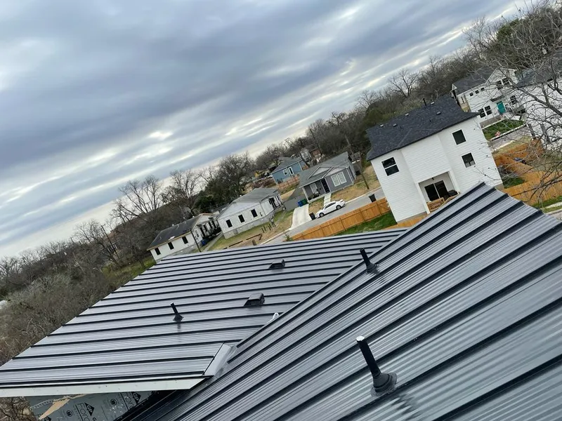 Standing seam metal roof panels with vents for Skylight Repair in Monona
